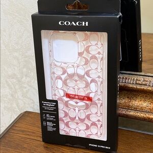 Coach Signature Glitter Pink iPhone 15 Pro Max Case.